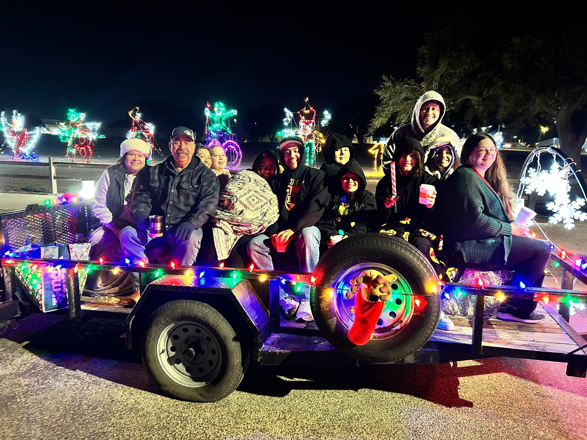 Car driving through Christmas lights